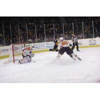 Lehigh Valley Phantoms goaltender Alex Lyon stops a Providence Bruins' shot