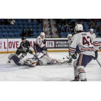 Vancouver Giants fight for the puck in front of the Kamloops Blazers' net