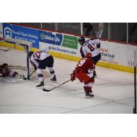 Braylon Shmyr of the Allen Americans (right in red) tries to help out this goaltender