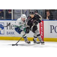 Justin Sourdif of the Vancouver Giants controls the puck against the Seattle Thunderbirds