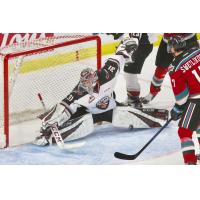 Vancouver Giants goaltender Trent Miner stretches to make a stop against the Kelowna Rockets