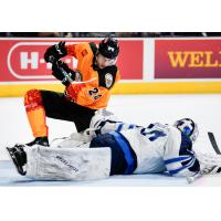 Manitoba Moose goaltender Mikhail Berdin makes a sprawling save on Klim Kostin of Los Chimuelos de San Antonio at the end of the second period