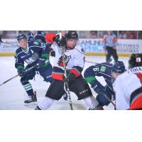 Mike Szmatula of the Adirondack Thunder battles the Maine Mariners