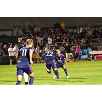 South Georgia Tormenta FC celebrates a goal against FC Tucson