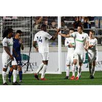 Memphis 901 FC forward Rashawn Dally (14) exchanges high fives with defender Marc Burch vs. North Carolina FC