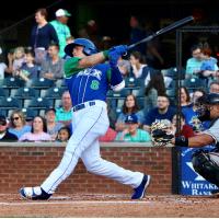 Nathan Eaton of the Lexington Legends takes a big swing