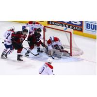 Vancouver Giants right wing Jared Dmitriw (22) shoots against the Spokane Chiefs