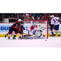 Vancouver Giants right left wing Owen Hardy in front of the Spokane Chiefs net