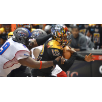 Defensive lineman Harold Love (left) with the Portland Thunder