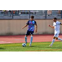 Forward Madison FC defender Gustavo Fernandes