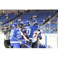 Wichita Thunder tussles with the Tulsa Oilers in their season opener