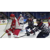 Allen Americans defenseman Matt Register (left) vs. the Tulsa Oilers