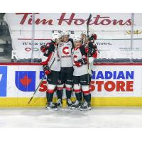 Prince George Cougars congratulate Koehn Ziemmer on his goal vs. the Vancouver Giants