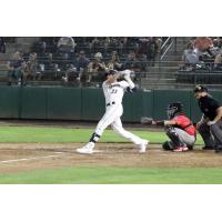 Tri-City Dust Devils first baseman Kenyon Yovan takes a big swing