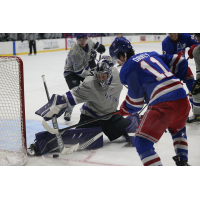 Tri-City Storm goaltender Arsenii Sergeev stops a shot from the Des Moines Buccaneers