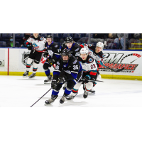 Victoria Royals right wing Alex Edwards leads the charge against the Kelowna Rockets