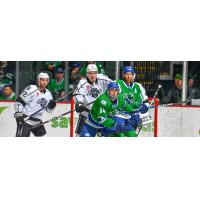 Ontario Reign's Alan Quine and Abbotsford Canucks' Linus Karlsson in action