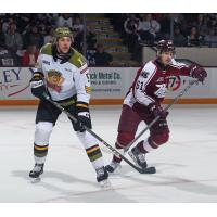 North Bay Battalion's Tnias Mathurin and Peterborough Petes' Chase Stillman on game night