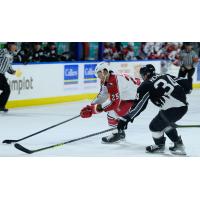 Allen Americans right wing Aidan Brown controls the puck