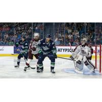 Peterborough Petes' Brennan Othmann versus Seattle Thunderbirds' Jared Davidson and Lucas Ciona