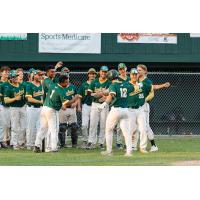 Sanford Mainers' Devin Russell congratulated by team