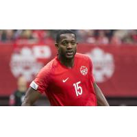 Defender Doneil Henry with Team Canada