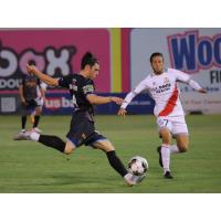 Las Vegas Lights FC's Lucas Stauffer and Sacramento Republic's Keko Gontan in action