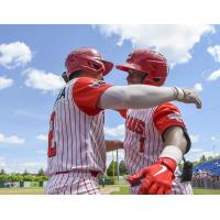 Ottawa Titans' Jason Dicochea and Jackie Urbaez celebrate win