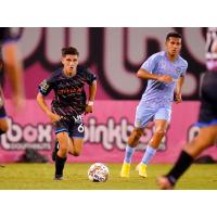 Las Vegas Lights FC's Alexander Romero and El Paso Locomotive FC's Aaron Gomez on the field