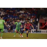 Seattle Sounders FC's Alex Roldan battles FC Dallas' Asier Illarramendi