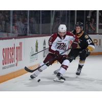 Peterborough Petes' Connor Lockhart battles Kingston Frontenacs' Duncan Schneider