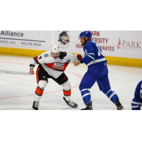 Kansas City Mavericks' Ryan Jones battles Wichita Thunder's Dillon Boucher