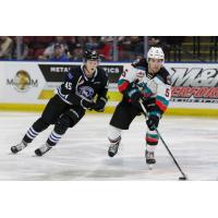 Wenatchee Wild's Steven Arp and Kelowna Rockets' John Babcock in action