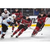 Red Deer Rebels centre Matthew Gard and right wing Dwayne Jean, Jr. (far right)