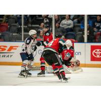 Kelowna Rockets defend against the Tri-City Americans