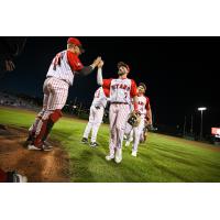 Ottawa Titans exchange high fives following a win