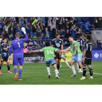 Seattle Sounders FC and Minnesota United FC on the field