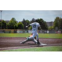 Riley Frost of the Royal Oak Leprechauns digs for first