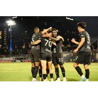 FC Tulsa celebrates a goal against Miami FC