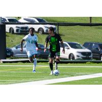 Lexington SC defender Jorge Corrales with possession against Velocity FC