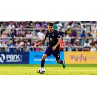 Louisville City FC defender Wesley Charpie with possession