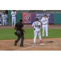 Tri-City Dust Devils first baseman Cam Williams comes in to score