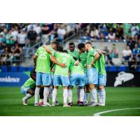 Sounders FC huddle