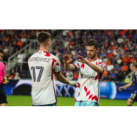 Chicago Fire FC's Brian Gutiérrez congratulated by Hugo Cuypers