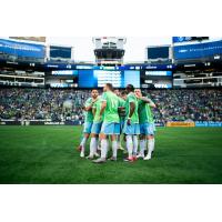 Sounders FC huddle