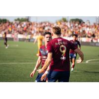 Detroit City FC reacts after a goal by Ben Morris