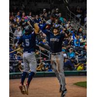 Somerset Patriots catcher Rafael Flores celebrates his home run