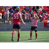 Amer Didić (left) and Manu Aparicio of Atlético Ottawa