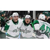 Texas Stars' Arttu Hyry, Justin Hryckowian, and Antonio Stranges celebrate win