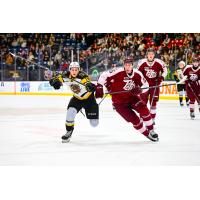 Peterborough Petes defenceman Martin Matejicek (right) races for the puck